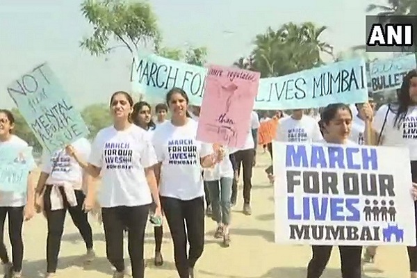 Mumbai residents take out a march to protest gun control laws in the US, leave people amused