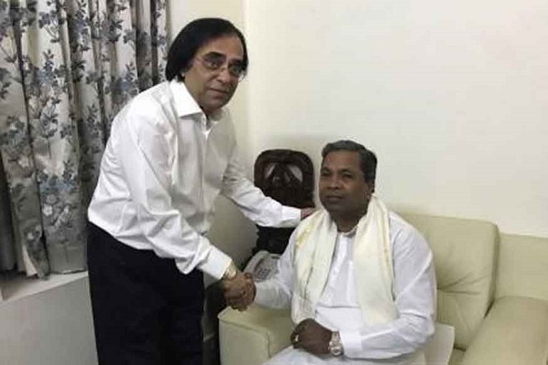 Controversial businessman accused of land grabbing and murder joins Congress in Karnataka
