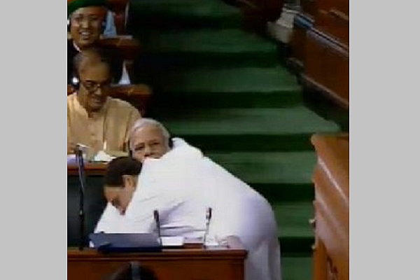 In an iconic moment Rahul Gandhi hugs and winks at PM Modi in Parliament, Twitter erupts in reactions