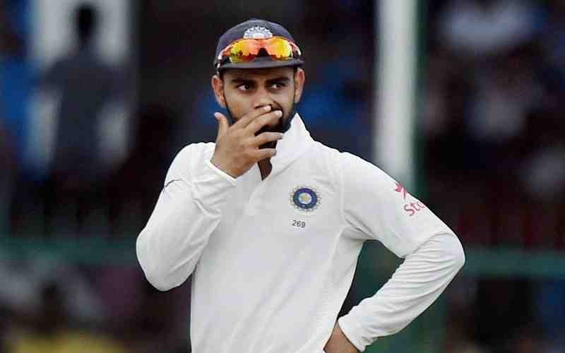Virat Kohli thinking