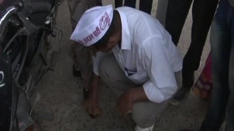 Madhya Pradesh: candidate polishes shoes to woo voters ahead of assembly polls