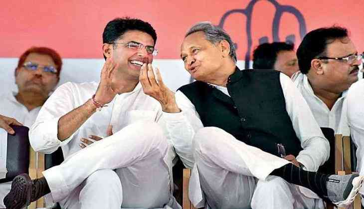 Supporters of Sachin Pilot climb a water tank demanding his appointment as Rajasthan CM