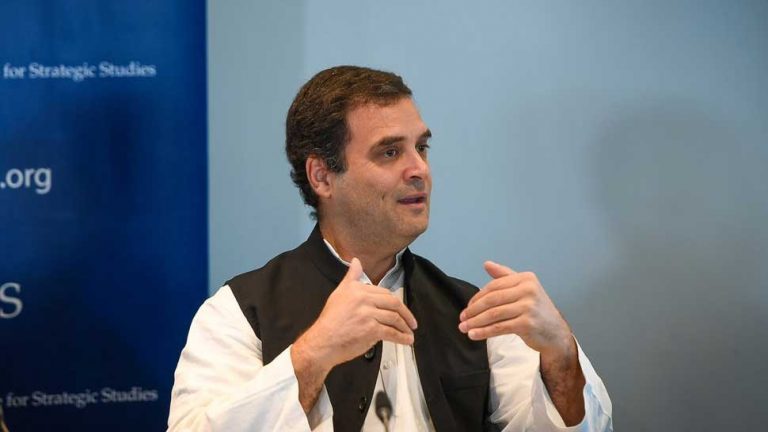 Congress President Rahul Gandhi halts his speech during Azaan