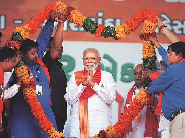 PM Modi at a rally, Image source: Business Standard