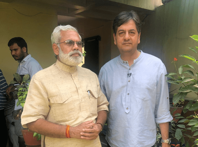 Ex-NDTV CEO Vikram Chandra poses with a Modi lookalike in Varanasi, gets roasted