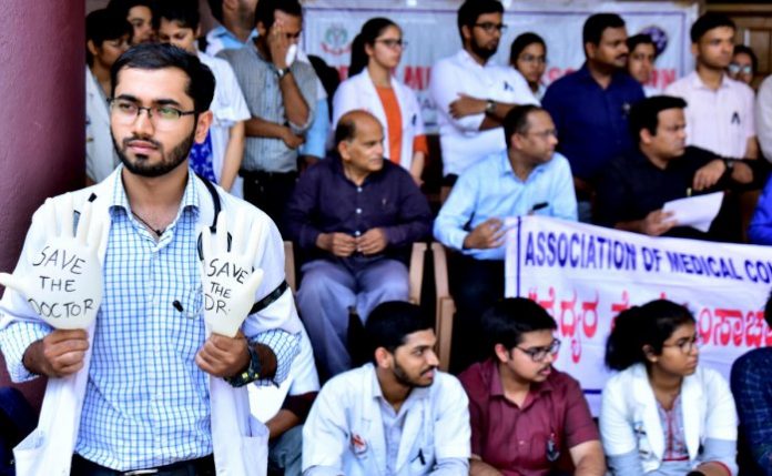 Watch powerful videos that personify besieged doctor's grit and resilience