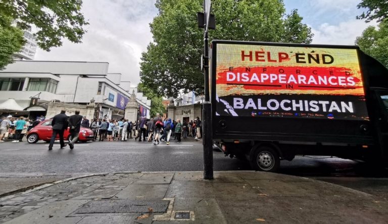 Mobile billboard with “Help end enforced disappearances in Balochistan” message seen outside Lord’s cricket ground before World Cup Final