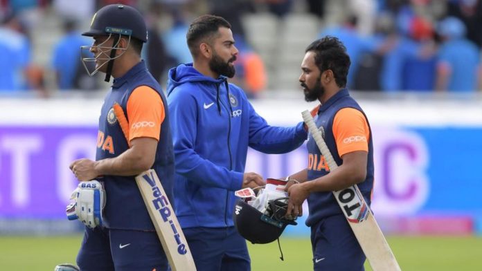 Dhoni and Jadhav with Kohli