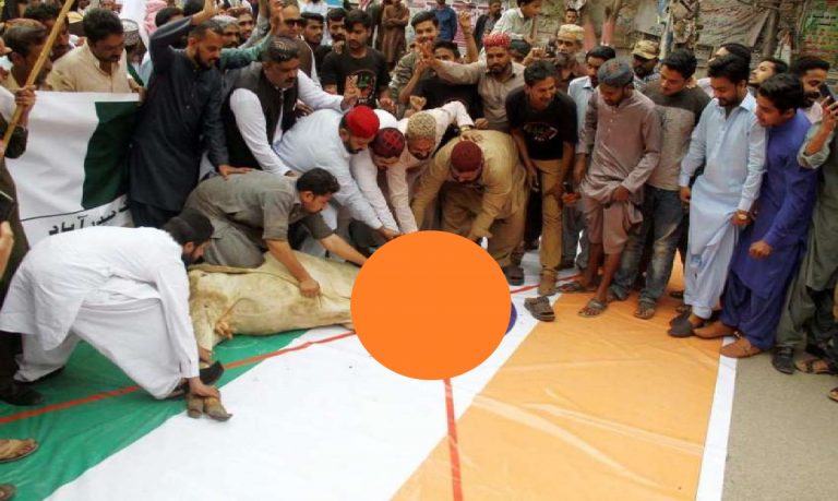 Viral video showing Pakistanis slaughtering cow on Indian flag is real, but it is old