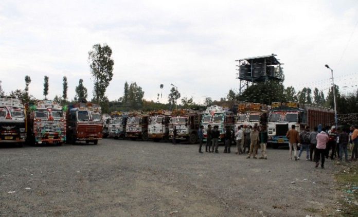 Truck drivers and apple traders suffer losses amidst security threat from Islamists targeting the apple business