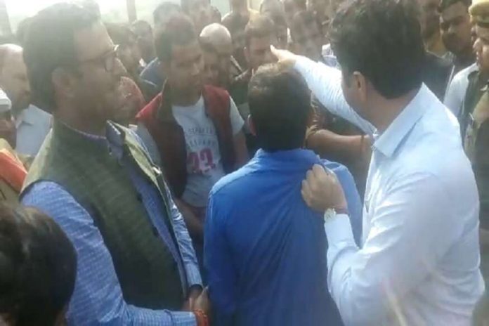 Amethi DM Prashat Sharma seen dragging a man by his shirt in viral video