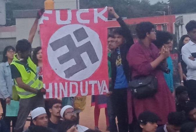 Anti-CAA protesters in Bengaluru display blatant Hinduphobia by distorting Hindu Om symbol to look like the Nazi symbol