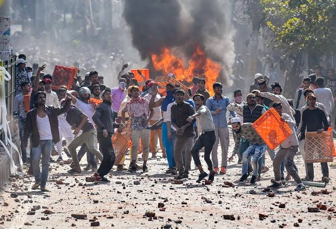 Violence in several parts of Delhi appears orchestrated to coincide with US President’s India visit: MHA sources