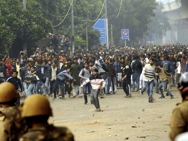 Watch: Another video surfaces showing rioters in Jamia pelting stones against Delhi Police from inside the campus