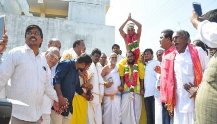 Dalit man carried on shoulders inside the temple by a priest in Telangana