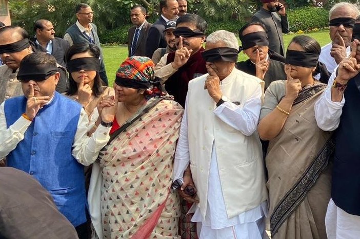 TMC MPs protest blindfolded over Delhi’s anti-Hindu riots, get roasted by netizens
