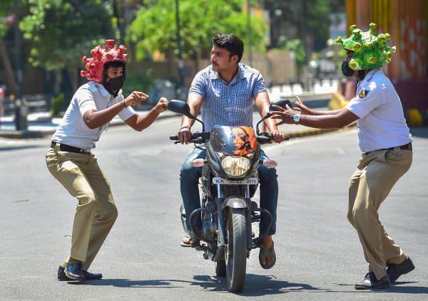 From skits to hiring artists and dressing them up as coronavirus, police officials employ innovative means to create awareness about the threat posed by novel COVID-19