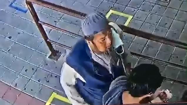 Here is the truth about the viral video of a Muslim man infected with Coronavirus spitting on a man standing in front of him