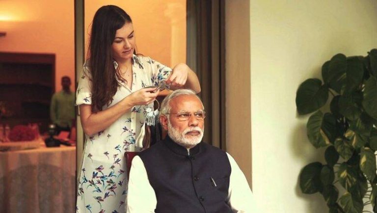 Congress stoops to new low, makes perverse claim about PM Modi using old photograph of PM with Madame Tussauds’ female employee