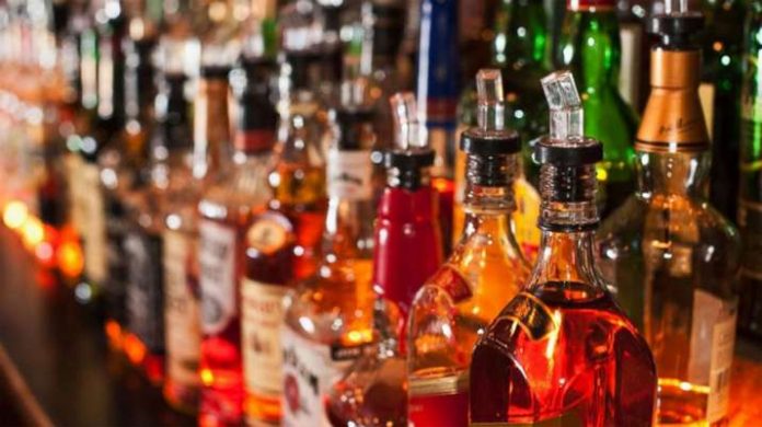 Liquor shops see large gatherings across the country, social distancing rules flouted in many areas