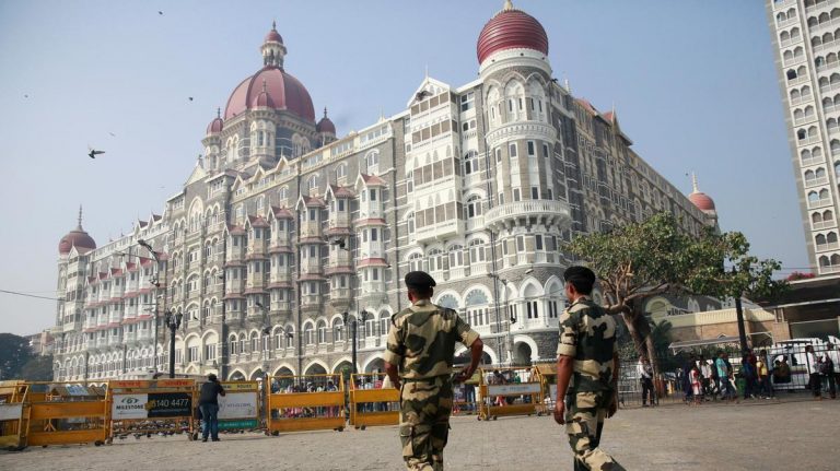 Security tightened outside Taj hotels in Mumbai after a call threatening 26/11 style attack