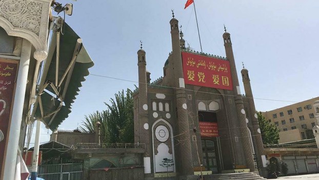 China has razed a mosque in Xinjiang and built a public toilet on the site, say reports