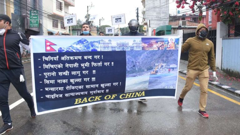 Nepali Youths protest outside the Chinese embassy in Kathmandu against Chinese construction on Nepali territory in Humla