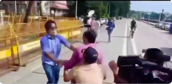ABP journalist manhandles and slaps psephologist Pradeep Bhandari