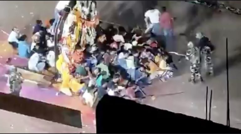 While Munger video shows devotees protecting Maa Durga’s Murti in silence as the police unleashed blows, SP claims they shot their own