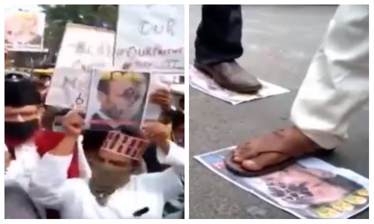 Muslims hold placards with picture of French President with a footprint over his face during anti-France protest near the French consulate in Kolkata