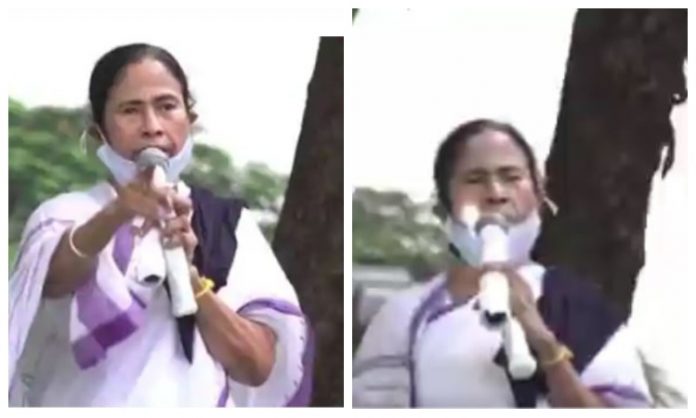 TMC calls Mamata Banerjee ‘vaccine’ against ‘BJP pandemic’ as she throws a torchlight inside her mouth for mysterious reasons