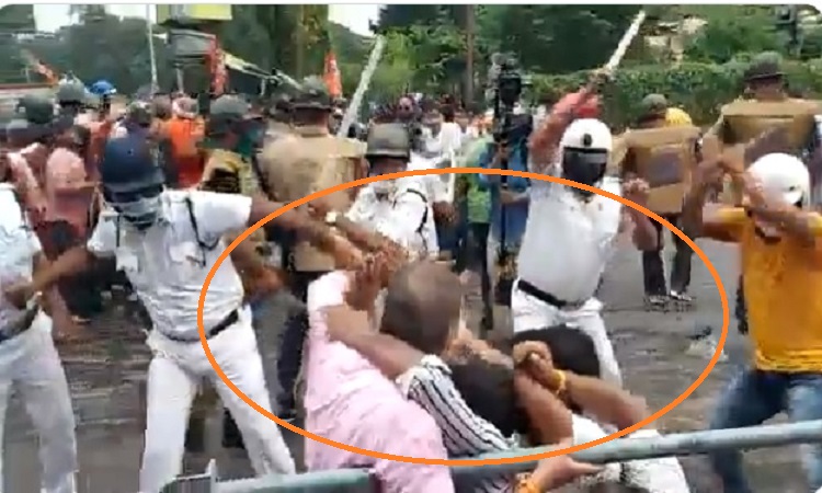 Watch: West Bengal police beat up an elderly person for protesting against Mamata Banerjee-led West Bengal govt