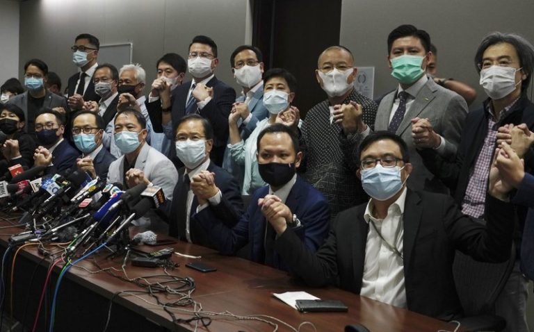 Pro-Beijing administration in Hong Kong disqualifies four pro-democracy legislators, other lawmakers threaten to resign