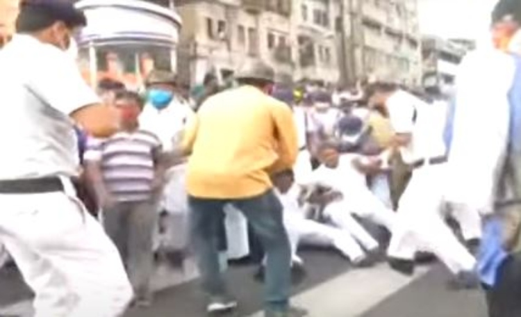 West Bengal police assault BJP workers taking out a rally in Kolkata to protest against continuing assault on BJP workers in the state