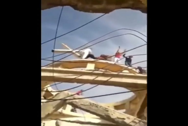 Syria: Islamist mob storms a Greek orthodox church, pulls down the cross to protest against France
