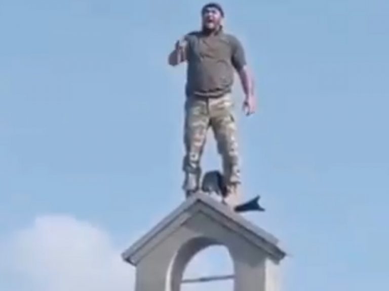 Watch: Azerbaijani soldier screams ‘Allahu Akbar’ while standing atop a desecrated church in occupied territory in Armenia