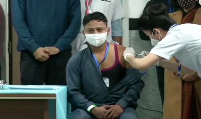 Watch: Sanitation worker Manish Kumar becomes the first person to receive Coronavirus vaccine at AIIMS Delhi