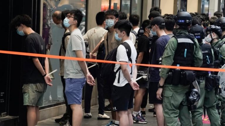 Hong Kong authorities arrest 53 opposition leaders under the national security law as China escalates crackdown on pro-democracy camp