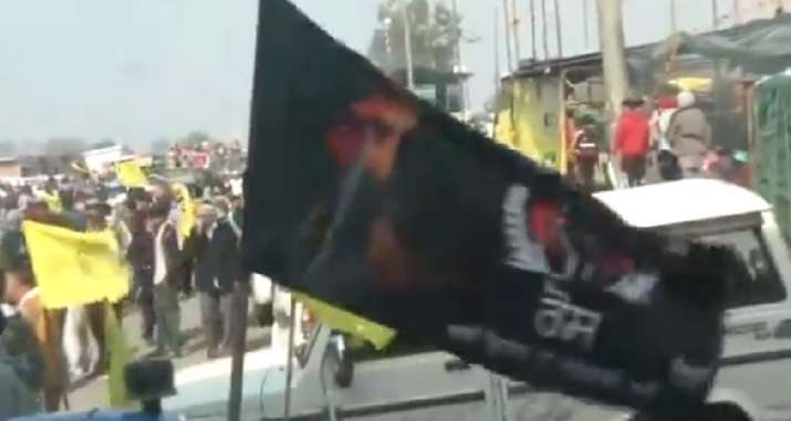 Farmer organisation’s flag with portrait of Khalistani terrorist Jarnail Singh Bhindranwale seen in Ludhiana during ‘Chakka Jam’