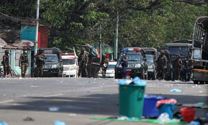 Pro Democracy protesters in Myanmar set Chinese factories on fire