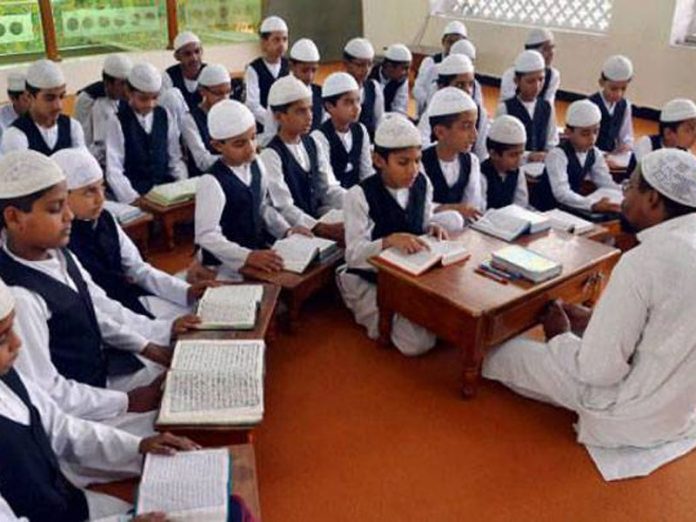 Is the government forcing madarsas to teach Ramayana and Vedas?