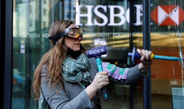 London: Extinction Rebellion activists vandalize windows of HSBC bank protesting against fossil fuel financing, 9 arrested