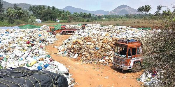Trucks from Kerala caught dumping medical waste in Tamil Nadu’s Coimbatore, police seize trucks and earthmover