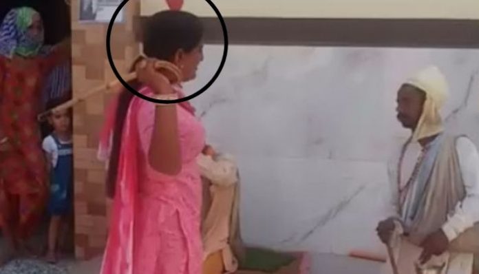 Despite not wearing mask herself, transgender Congress councillor thrashes two Hindu Sadhus