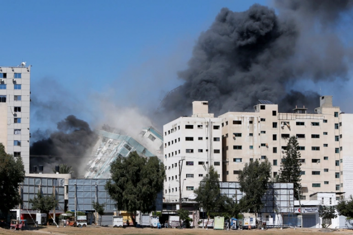 Demolished building that housed Al Jazeera and other media offices was used by Hamas, says IDF in statement