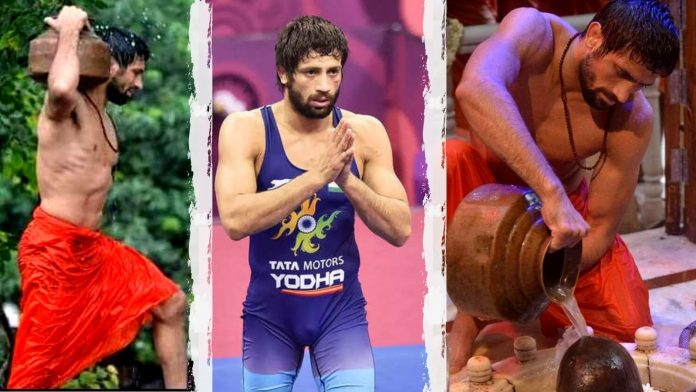 Wrestler Ravi Dahiya seen performing the Jalabhishek ritual at a Shiva temple