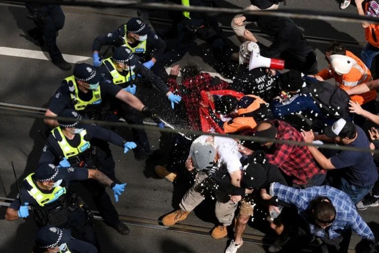 Australia: Violent protesters take to streets against draconian lockdown restrictions, assault police officers