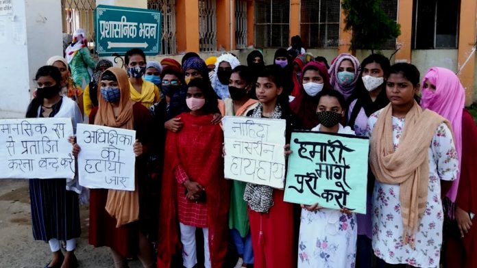 Muslim minority girls protesting against burqa rule