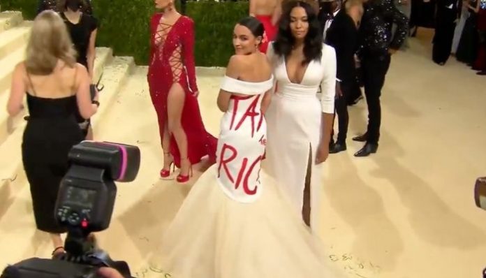 AOC shows up at MET Gala event wearing 'Tax the Rich' dress, gets slammed
