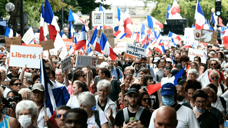 Watch: Citizens of France protest against Macron’s vaccine passport mandate, chant ‘freedom’, force police to retreat